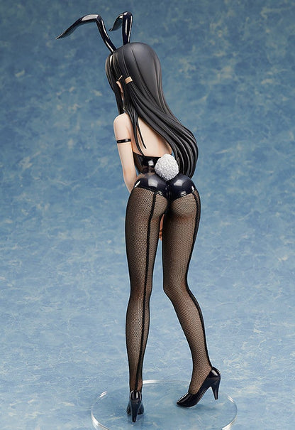 Black bunny suit figure with fishnet stockings bunny ears and white tail viewed from behind