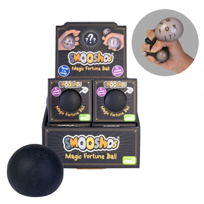 Retail display of Smooshdos Magic Fortune Balls, An inset shows a hand squeezing the ball to reveal a message