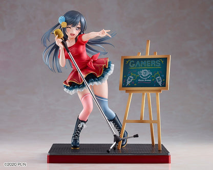 Anime girl figurine in red outfit winks, points, and holds a microphone stand next to a "GAMERS" chalkboard.