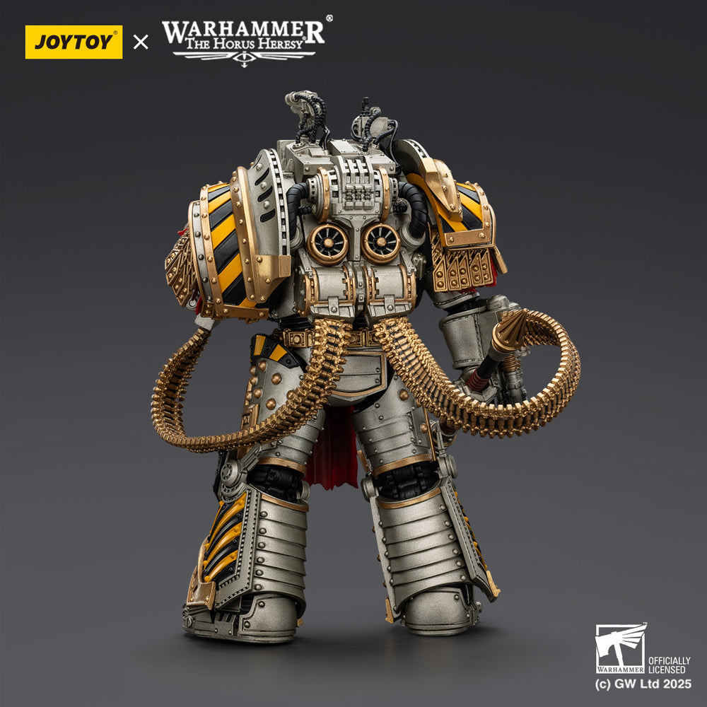Rear view of a Joytoy Warhammer Horus Heresy dreadnought. Silver & gold armor, hazard stripes, and massive ammo belts
