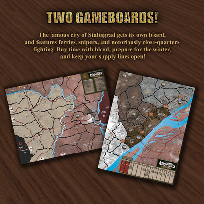 Two Axis & Allies: Stalingrad map gameboards on a wood table, showing the battle area and city detail maps for the World War II strategy game