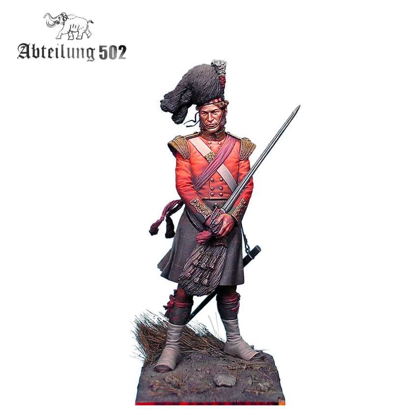 A painted miniature of a 79th Cameron Highlanders Crimea 1854 Figure in a red jacket, kilt, and fur hat, holding a sword