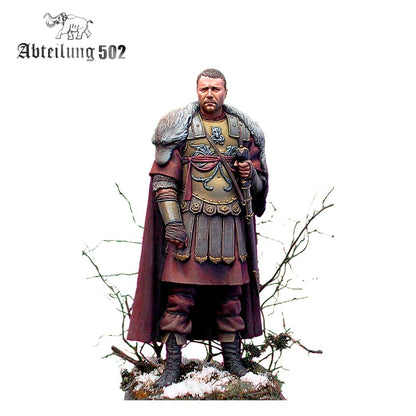 A miniature of a Roman general in ornate armor with a fur-lined cloak, holding a staff, on a snowy base
