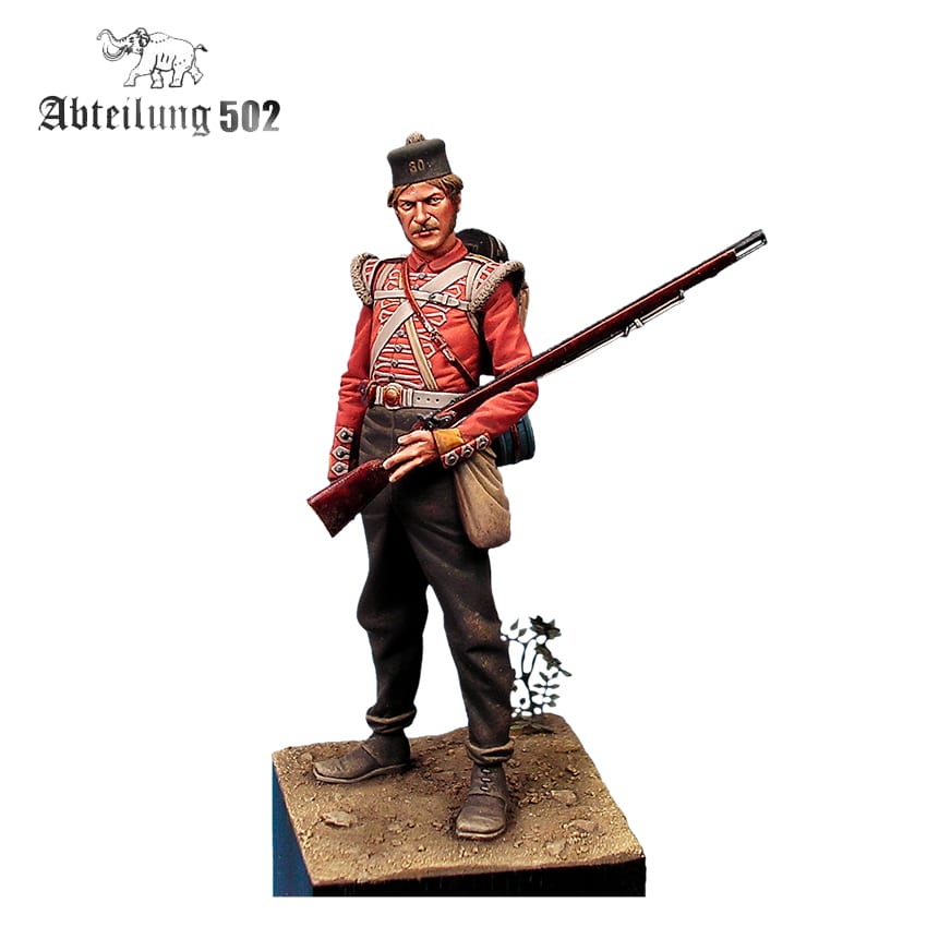 A miniature figure of a 30th Regiment of Foot soldier from Crimea 1854 in a red uniform holding a rifle standing on a textured base