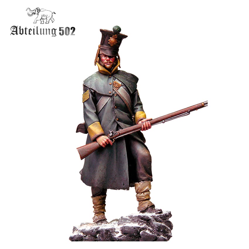 A painted miniature figure of a soldier in a dark historical uniform and shako, holding a musket, standing on a snowy base