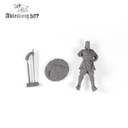 Gray resin AK Interactive Historical Resins Ubbe The Great Pagan Figure 54mm kit showing a bearded warrior, a textured base, and a spear