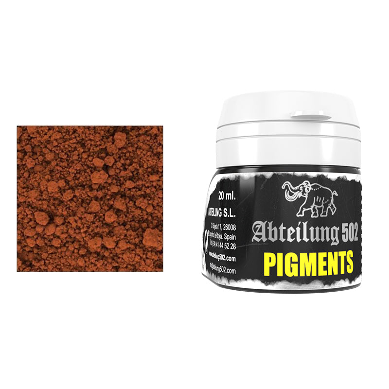 A jar of Abteilung 502 Pigments next to a close-up of reddish-brown granular powder