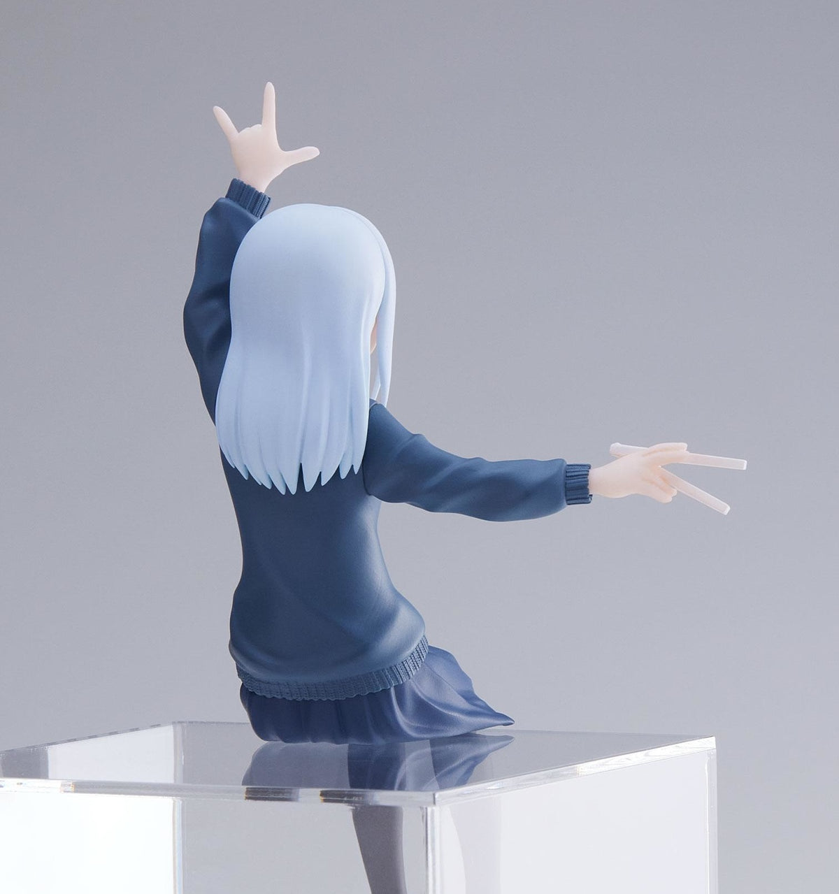 Rear angle of Aharen revealing long lavender hair and seated posture