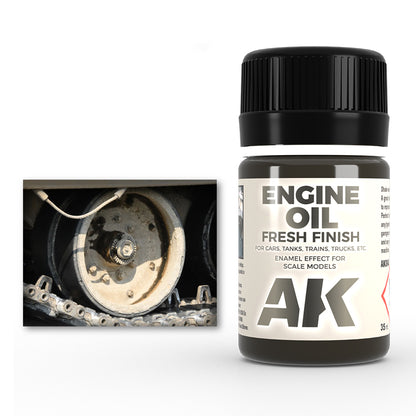 AK 'Engine Oil Fresh Finish' enamel effect paint bottle next to a dirty tank track