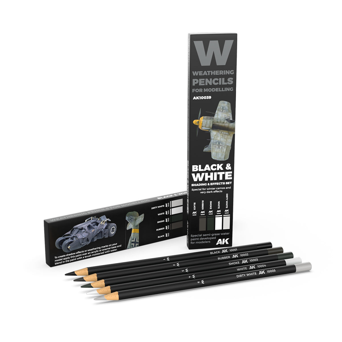 Five black AK Weathering Pencils for modelling -  with two product boxes featuring a model airplane and tank
