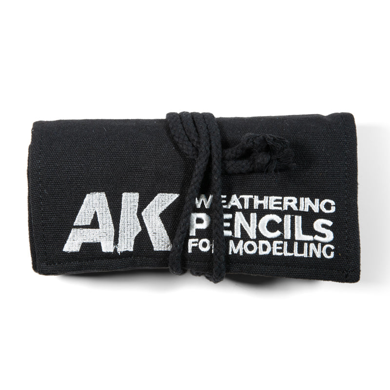A black fabric roll for AK Weathering Pencils for Modelling -  tied with a black cord