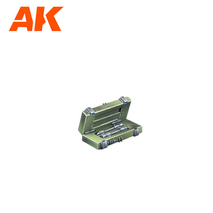 AK logo above an open olive-green case containing several grey cylindrical model parts