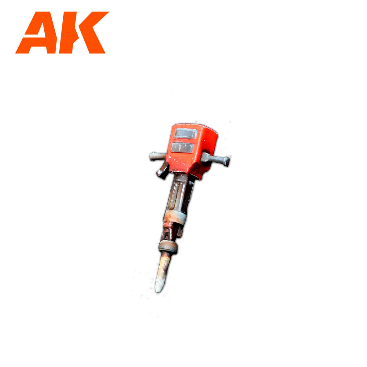A red and black jackhammer, a powerful tool used for breaking concrete, on a white background