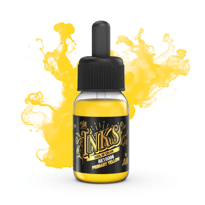 A clear bottle of AK Interactive 'Primary Yellow' ink with a dropper, surrounded by vibrant yellow ink splashes