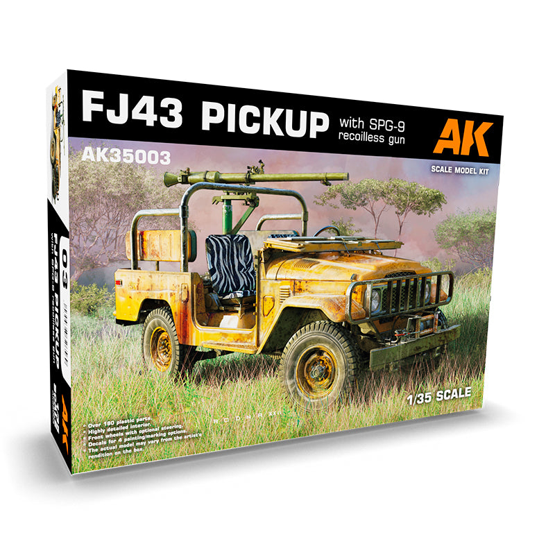 Scale model kit box: Rusty yellow FJ43 pickup truck with an SPG-9 recoilless gun in a grassy field