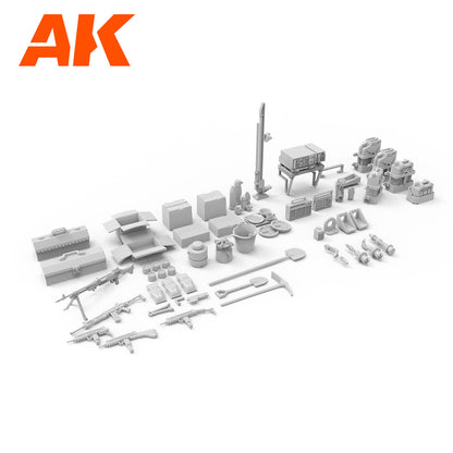 Unpainted gray plastic model kit accessories including weapons -  tools -  and gear -  laid out on a white background