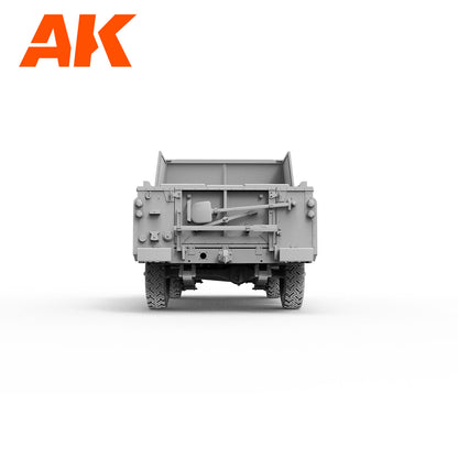 Detailed rear view of an unpainted gray military truck model kit -  with a shovel and pickaxe