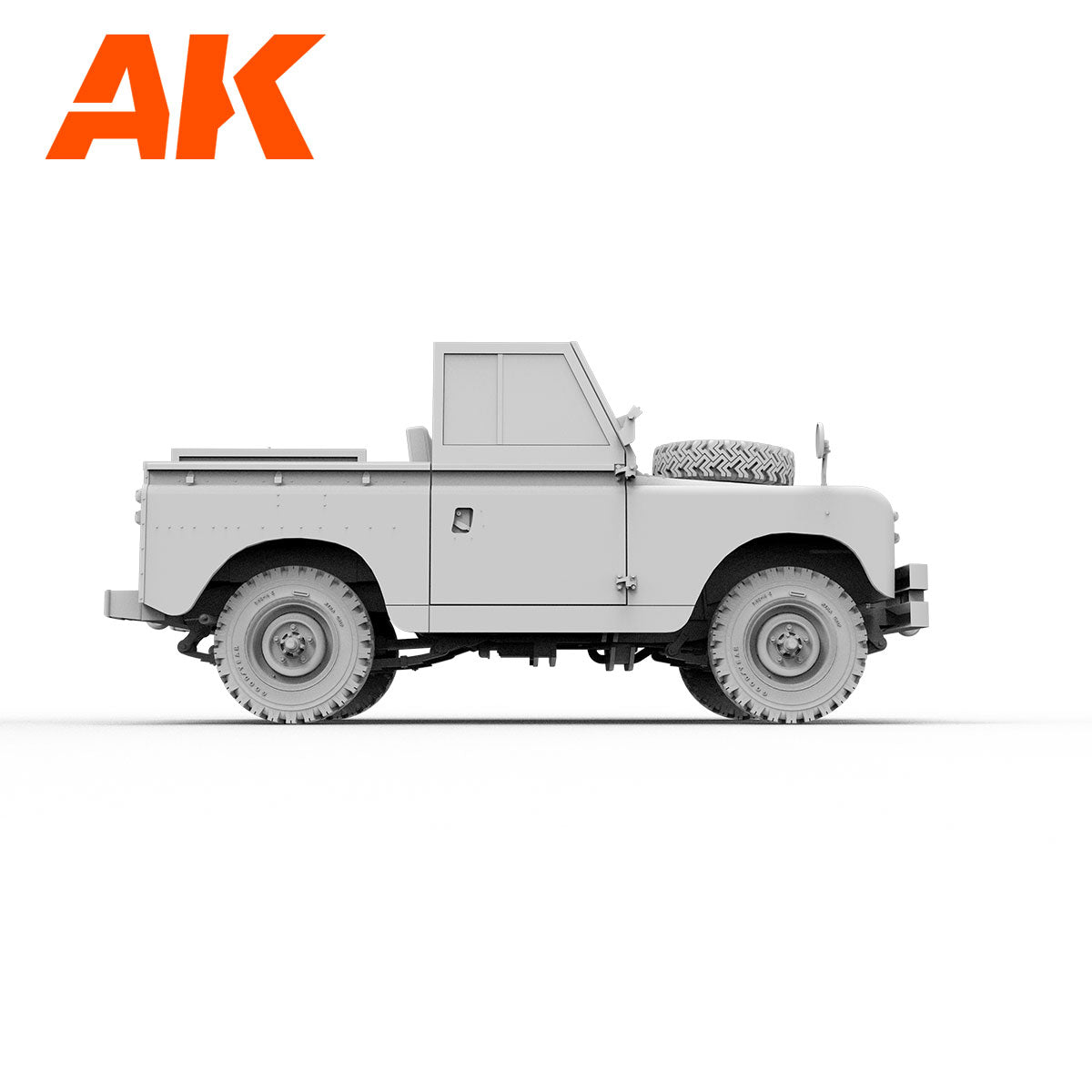 Side view of AK's unpainted gray classic Land Rover pickup truck model kit on a white background