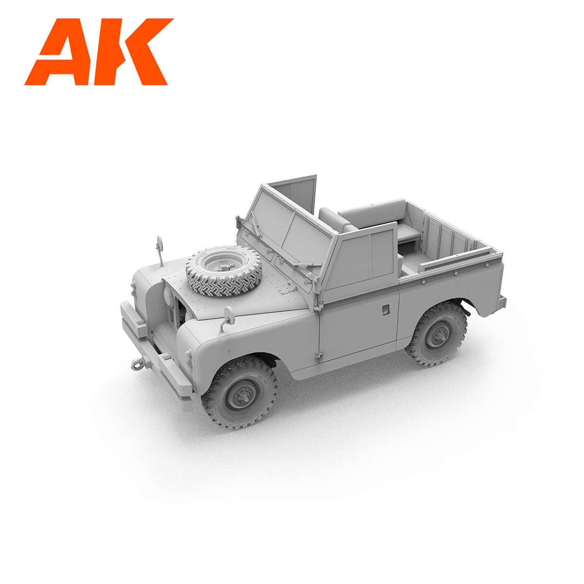 Unpainted gray Land Rover model kit with a spare tire on the hood