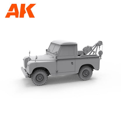 Grey model of a classic 4x4 pickup truck with a recovery crane in the bed