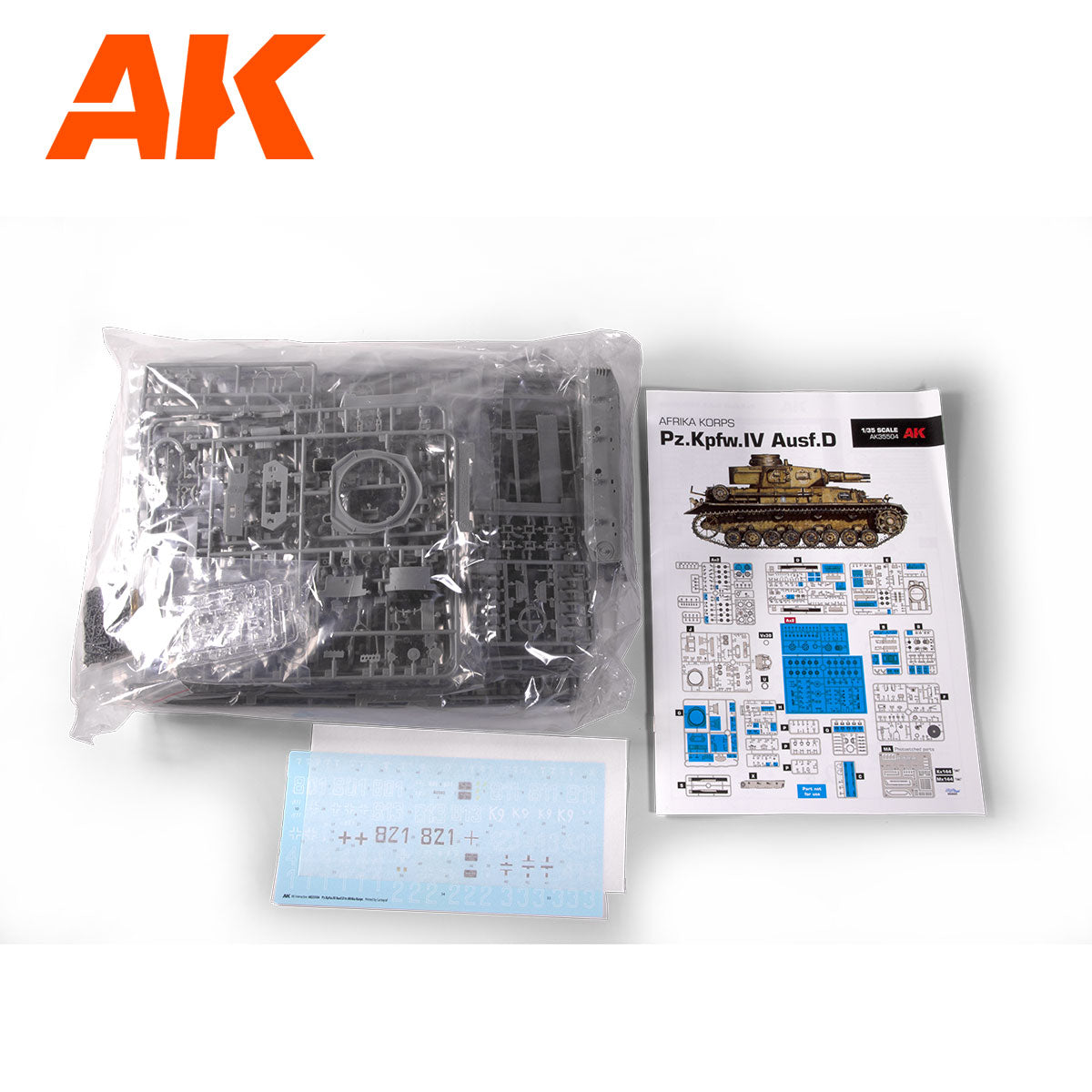Grey plastic parts in bag -  instruction booklet with tank illustration -  and decals