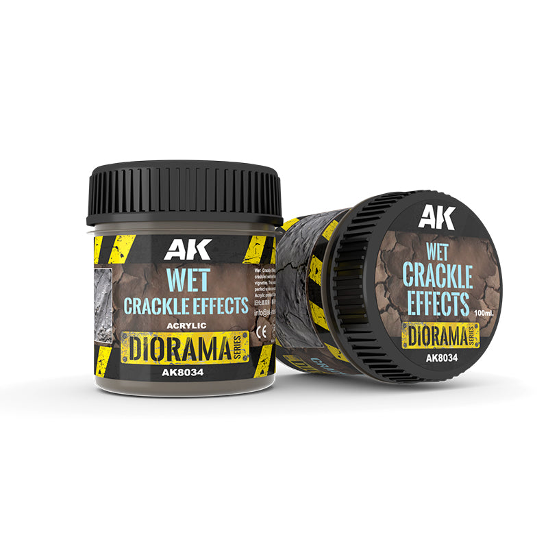Two AK Wet Crackle Effects acrylic diorama jars: one upright, one on its side, with cracked earth labels