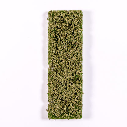 Rectangular model landscaping piece, covered in dense, textured light green foliage, on white