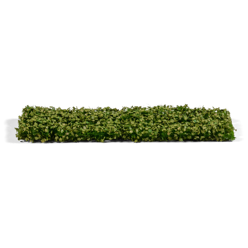 A long, rectangular artificial green hedge strip with textured foliage