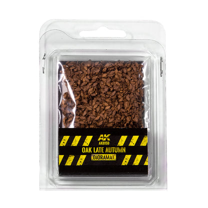 Clear blister pack with miniature brown oak leaves, labeled 'Oak Late Autumn Diorama'