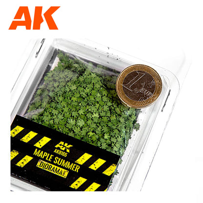 AK 'Maple Summer' diorama model leaves in a clear package, with a 1 Euro coin placed on top for scale