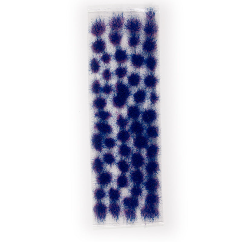 Clear package of small -  round -  fuzzy dark blue and purple tufts for model scenery