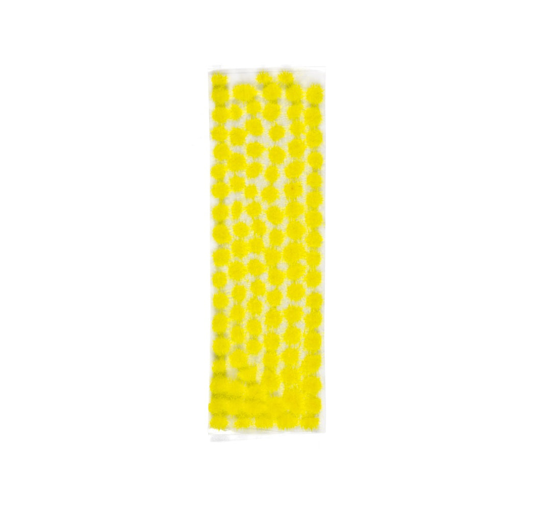 Vertical strip of bright yellow fuzzy dots on an adhesive sheet