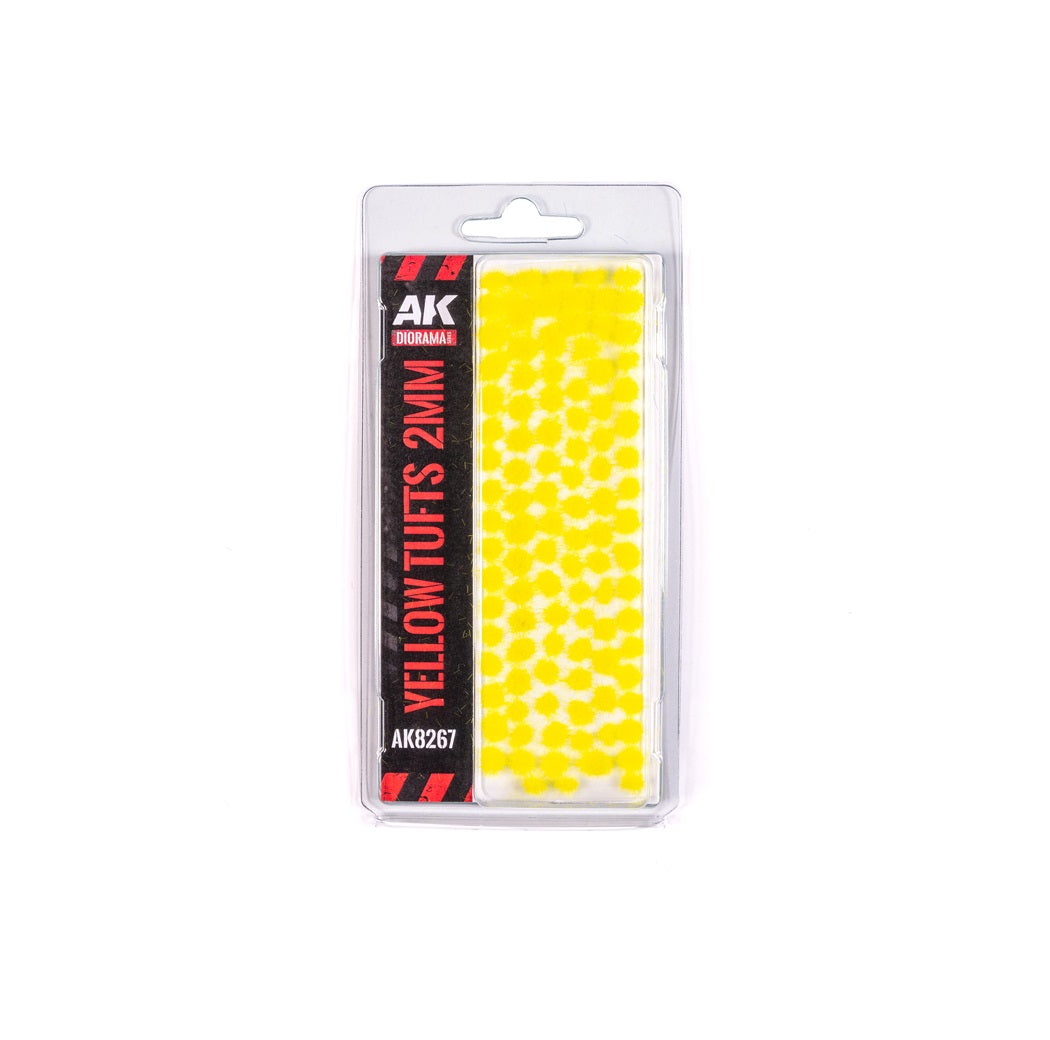 Packaged AK Diorama 2mm Yellow Tufts for model scenery, displaying the small bright yellow flock details