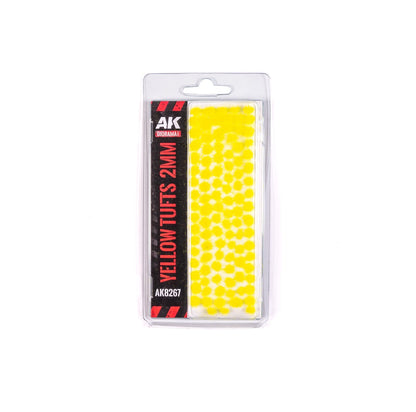 Packaged AK Diorama 2mm Yellow Tufts for model scenery, displaying the small bright yellow flock details