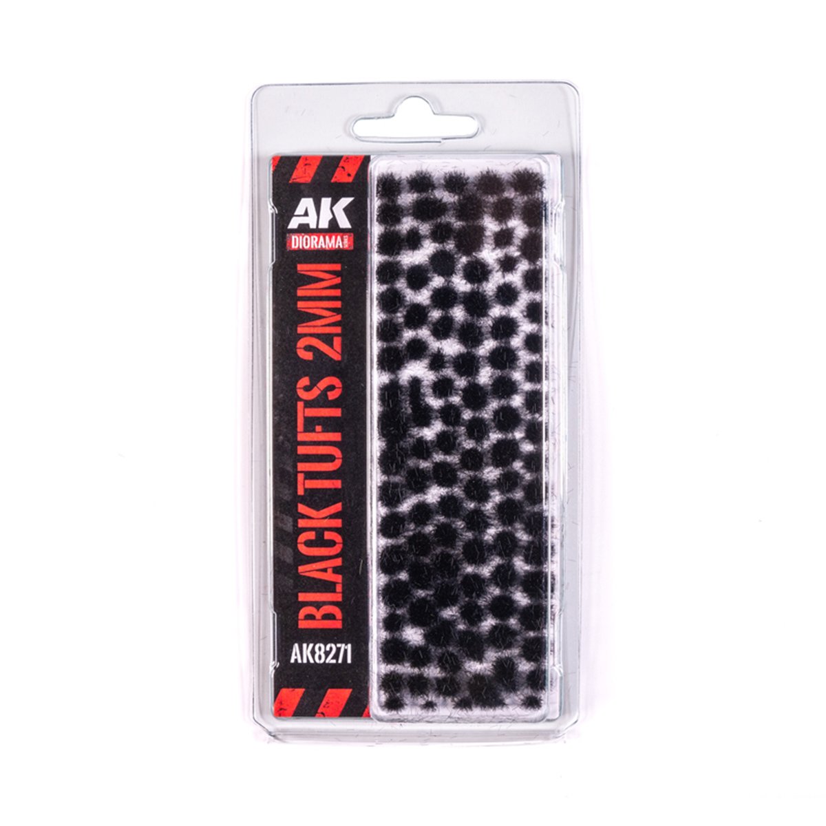 Package of black 2mm static grass tufts by AK Diorama for scale models