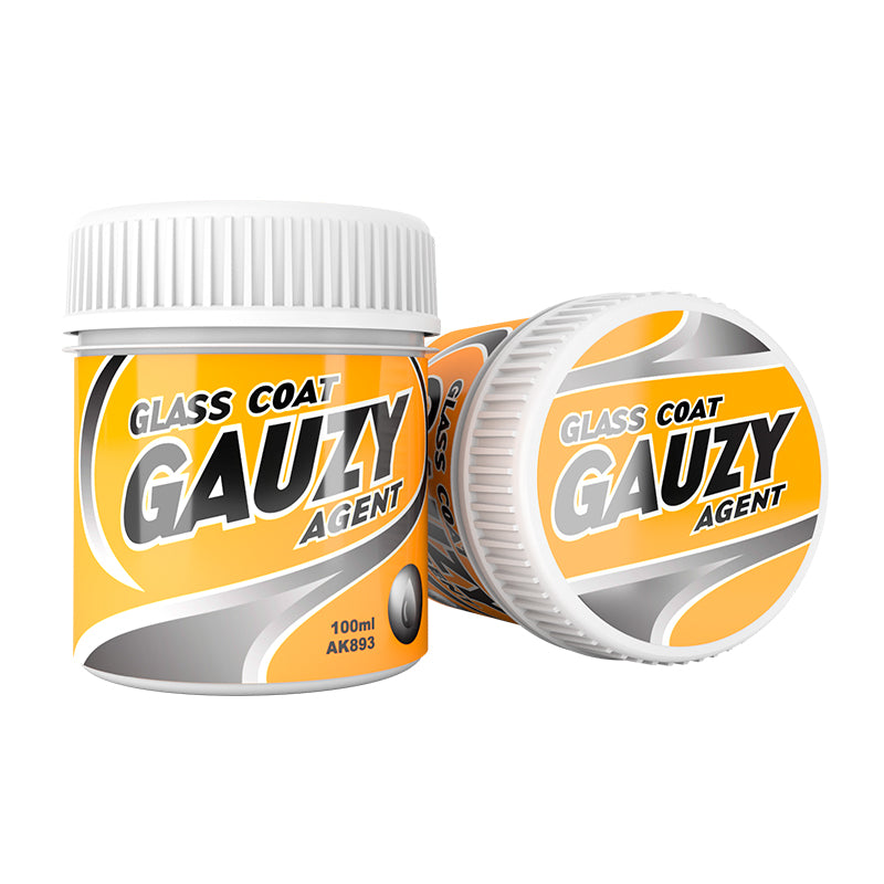 Two orange and black bottles of "GLASS COAT GAUZY AGENT" with white caps, one upright and one on its side.