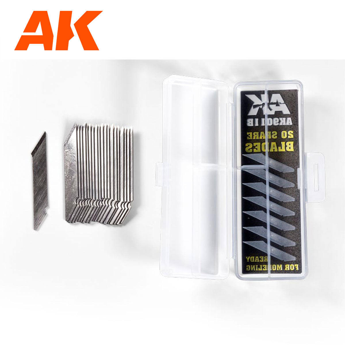 A stack of silver single-edge blades next to an open clear dispenser holding 20 new blades