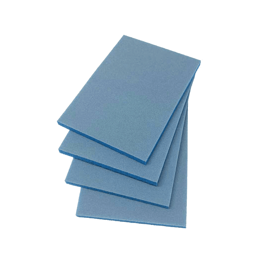 Four rectangular blue 400 Grit Fine Sanding Pads are stacked diagonally on a dark green background