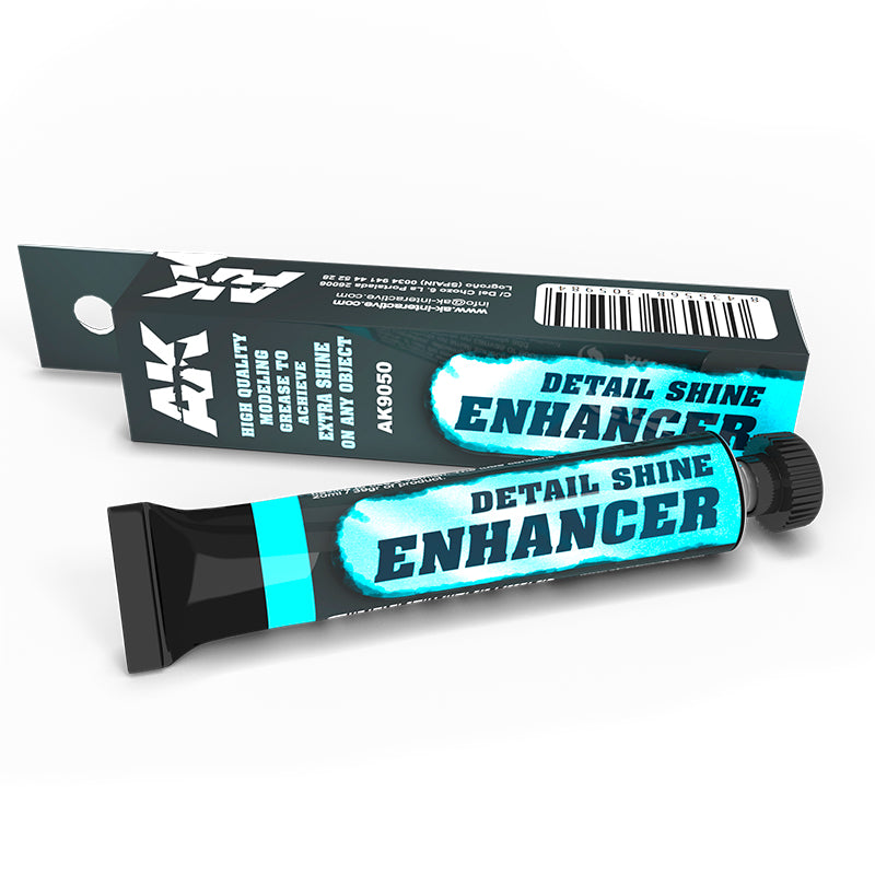 AK Detail Shine Enhancer tube & partially open box, black with cyan text, for modeling shine.