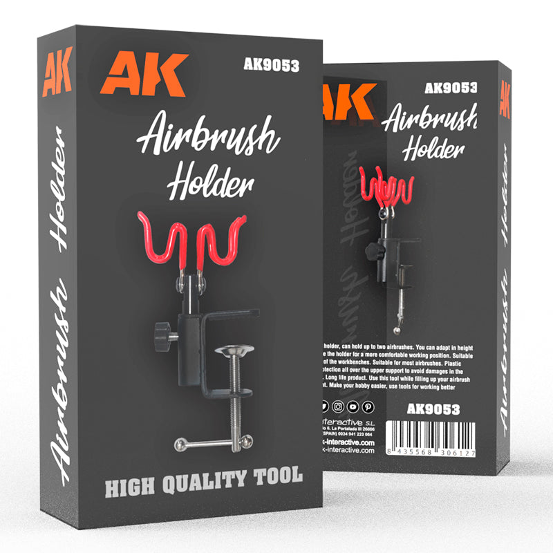 It shows a black, clamp-on tool with two red, adjustable rests for holding airbrushes