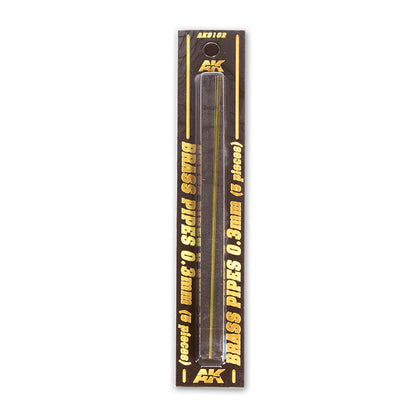 AK Brass Pipes 0.3mm (5 pieces) in dark packaging with gold text.