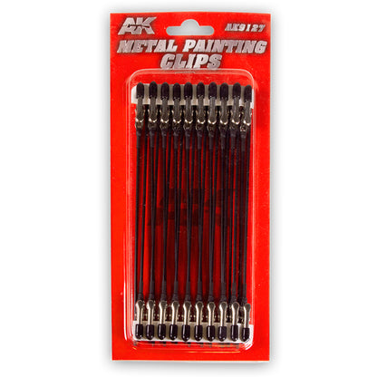 A red blister pack containing ten black AK Interactive metal painting clips with silver alligator clamps