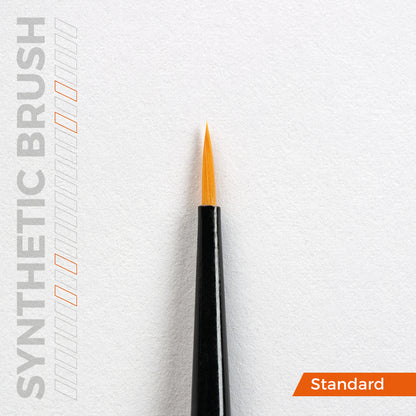A close-up of a synthetic precision brush with a fine orange tip and black handle on a white background, with SYNTHETIC BRUSH text and a Standard label
