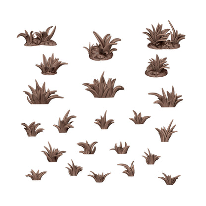 Collection of stylized brown foliage clumps and grass tufts against a white background