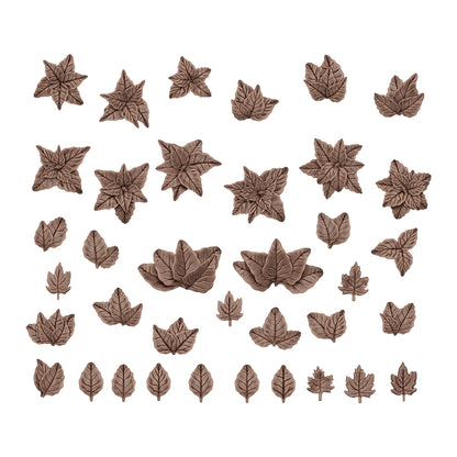 Assortment of embossed brown foliage and star-shaped chocolate decorations