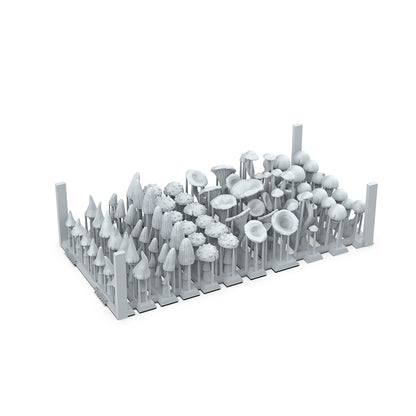 Gray miniature set featuring dozens of diverse fungi and mushrooms on a support base, against white background
