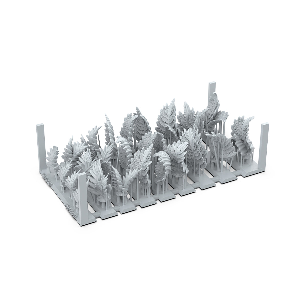 Gray miniature ferns and jungle plants on a base, ready for modeling or diorama assembly