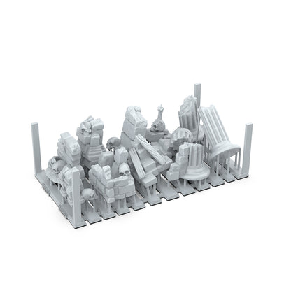 3D printed miniature terrain of ancient ruins: broken columns, rubble, stone walls, and scattered skulls
