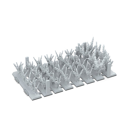 Unpainted resin miniature sprue featuring rows of dense, spiky brush terrain elements for wargaming or scale modeling