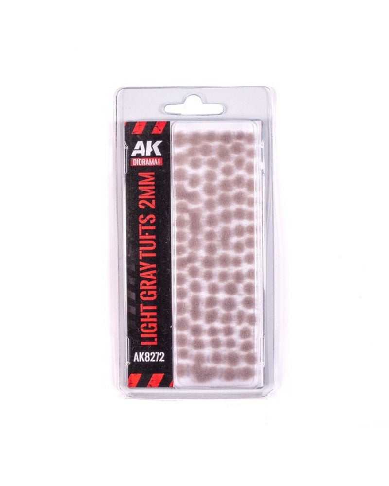 AK Diorama Light Gray Tufts 2mm in a clear blister pack, for detailing model terrain